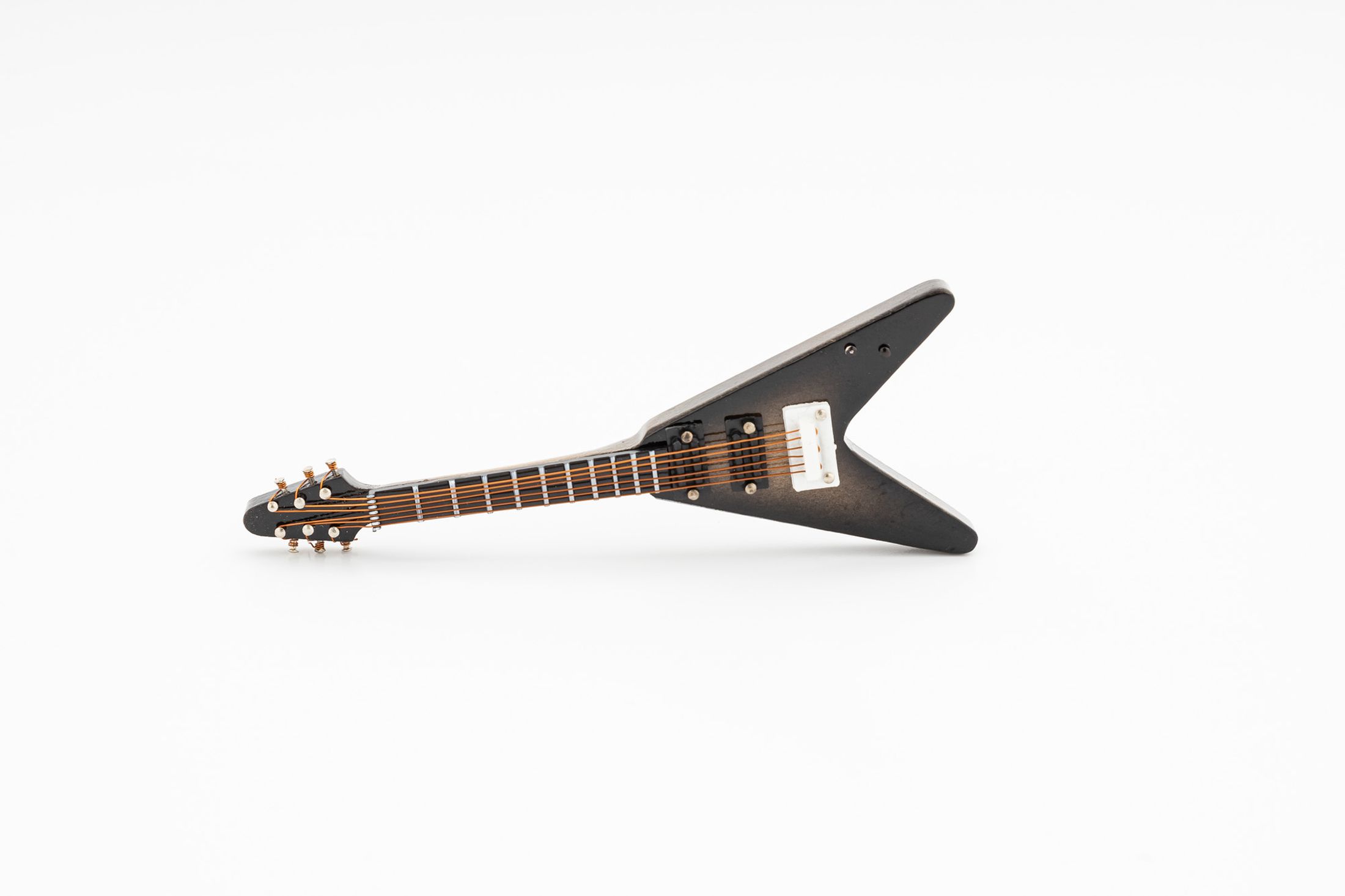 Produktabbildung »Flying V-Gitarre magnetisch«